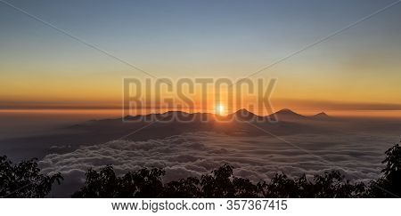Wonderful Remarkable Sunrise With Sea Of Clouds Below Dieng Plateau, Sumbing, Sindoro And Merbabu Vo