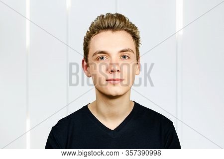 Portrait Of Young Guy With Pompadour Hairstyle