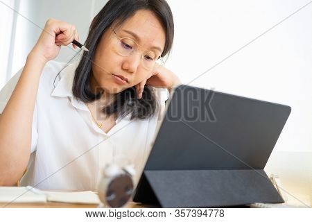 Work From Home Young Freelancer Or Businessman Working At Home Office With Smartphone Tablet. Workin