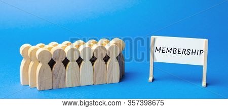 Team Of Workers And A Poster With The Word Membership. Belonging Of People To The Organization, Soci