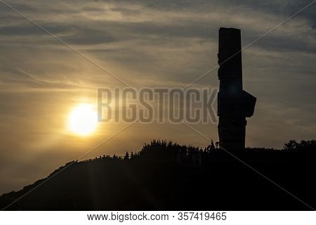 Gdansk, Poland - 23 August 2019: Silhouette Of A 25-metre High Monument Of The Coast Defenders Erect
