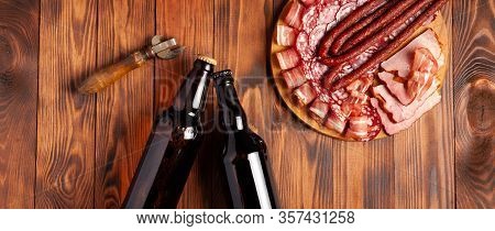 Beer Snack In The Form Of Meat Products And Bottled Beer. Appetizer In The Form Of Slicing Bacon, Sa