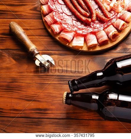 Beer Snack In The Form Of Meat Products And Bottled Beer. Appetizer In The Form Of Slicing Bacon, Sa