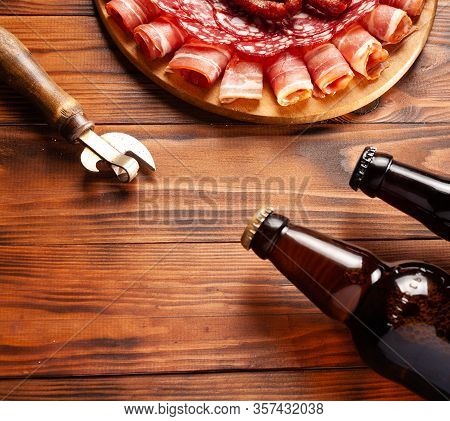 Beer Snack In The Form Of Meat Products And Bottled Beer. Appetizer In The Form Of Slicing Bacon, Sa