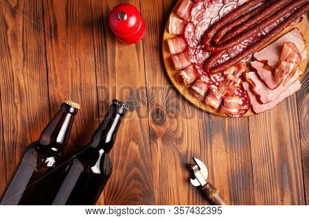 Beer Snack In The Form Of Meat Products And Bottled Beer. Appetizer In The Form Of Slicing Bacon, Sa