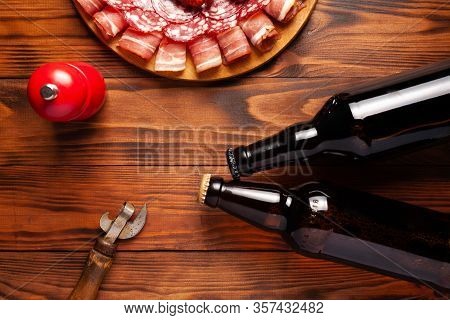 Beer Snack In The Form Of Meat Products And Bottled Beer. Appetizer In The Form Of Slicing Bacon, Sa