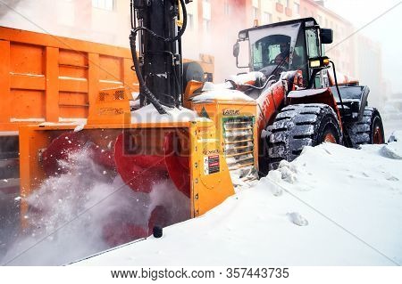 Norilsk, Russia - March 23, 2020: Closeup Of The Snow Impeller Of An Orange Snow Blower.