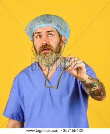 Medical Insurance. Doctor Ready Help. Diagnosis Concept. Man Bearded Doctor Wear Uniform Cap. Hipste