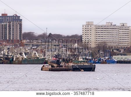 Old Work Boat On Barge In New Bedford Harbor