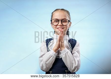 Cute Schoolgirl In Glasses Smile Implore Gesture