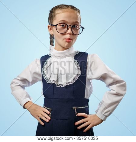 Cute Schoolgirl In Glasses Smile Implore Gesture