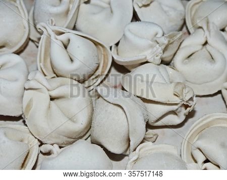 Siberian Pelmeni Made By Hand. Russian Pelmeni A Dish In The Form Of Boiled Products From Fresh Doug