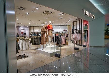 MUNICH, GERMANY - CIRCA JANUARY, 2020: entrance to Hallhuber store in Munich Airport.