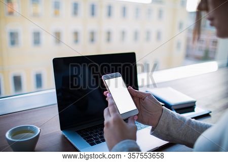 Closely Woman Professional Content Creator Holding Mobile Phone With Empty Mock Up Screen Background
