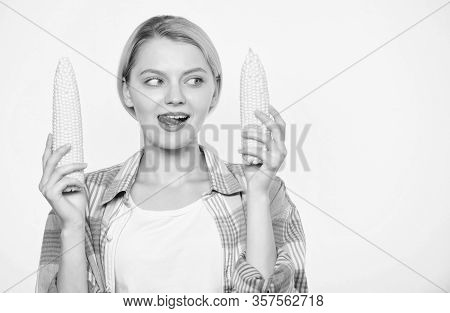 Raw Or Cooked. Agriculture And Cultivation. Corn Crop. Vitamin And Dieting Food. Happy Woman Eating 