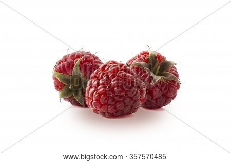 Raspberries Isolated On White Background. Three Ripe Raspberries Close-up. Raspberry With Copy Space