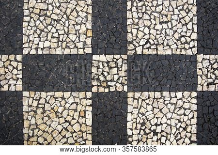 Closeup Surface Of The Blocky Pattern Old Stone Pavement