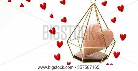 The Red Small Hearts Overflow Around The Pink Heart Enter The Gold Cage, And Fly Upwind.on White Bac