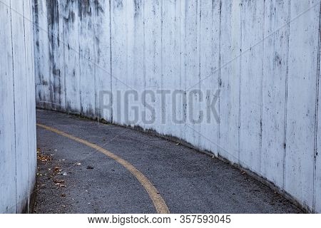 Roadway. Tunnel. Turn Left. No People. No Cars. No One. Manzano, Friuli-venezia Giulia. Italy