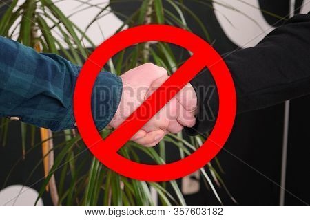 No Handshakes Greeting To Avoid The Spread Of Coronavirus. Covid-19 Changes Etiquette. No Handshake 