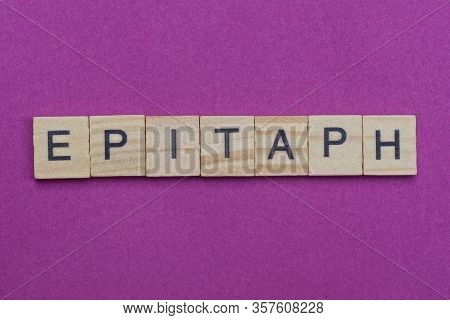 Word Epitaph From Wooden Letters Lies Red Backgound