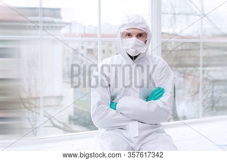 Safety Virus Infection Concept. Man In Protective Suit.