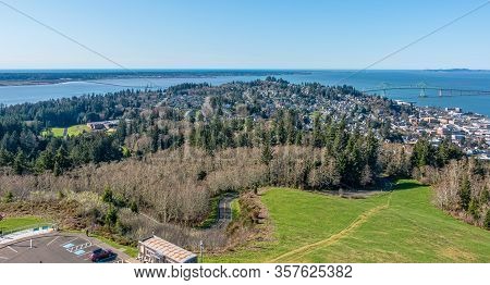 A Veiw From Above Of Astoria, Oregon And Two Brdiges.