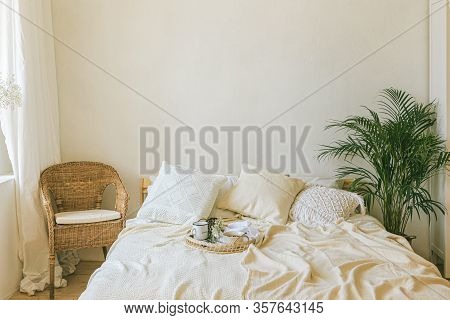 Modern Romantic Boho Style Bedroom Interior With Macrame Wall Panel