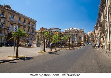 Italy, Catania, May 13, 2018: View Of Roman Amphitheater Ruins And Chiesa San Biagio In Sant Agata A