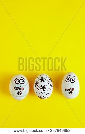 Eeaster Symbol Eggs In Medical Masks And Painted Coronavirus Bacteria On Yellow Background, Space Fo