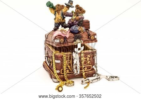 Treasure Chest Filled With Jewelry On White Background
