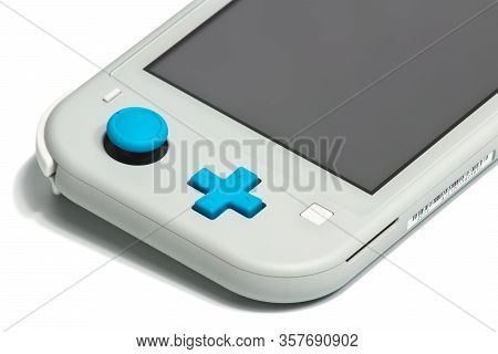 Moscow, Russia - February 18, 2020: Grey Nintendo Switch Lite On White Background. Latest Entry Into
