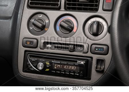 Honda Capa- A Close Up On A Gray Panel With Radio,  Player , Ventilation System And Air Conditioning