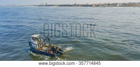 Callao, Lima, Peru - 2020: fisherman in coasts of Callao 2020 in Lima, Peru