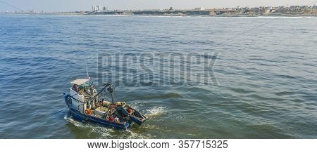 Callao, Lima, Peru - 2020: fisherman in coasts of Callao 2020 in Lima, Peru