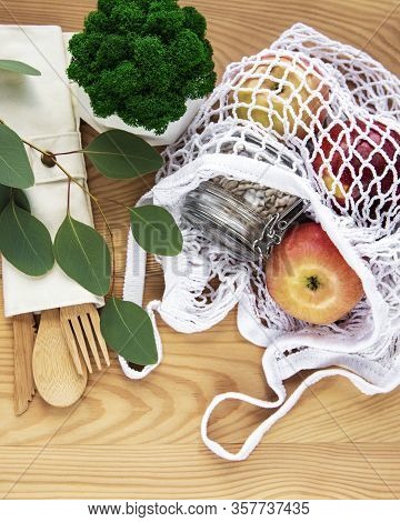 Net Bag With Reusable  Glass Jars, Fruits And Bamboo Cutlery. Zero Waste Concept. Eco Friendly. Flat