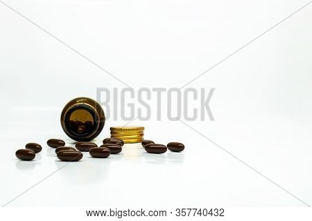 Multivitamin Softgel Capsules With Blurred Bottle With A Room For Text