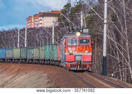 Freight Train Moves By The Spring Forest.