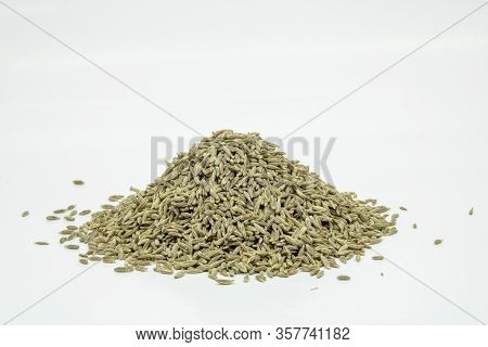 Raw Cumin Seeds Isolated On White Background