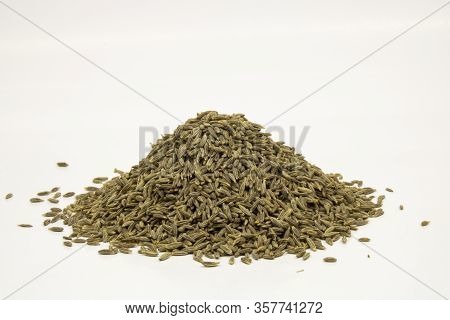 Raw Cumin Seeds Isolated On White Background