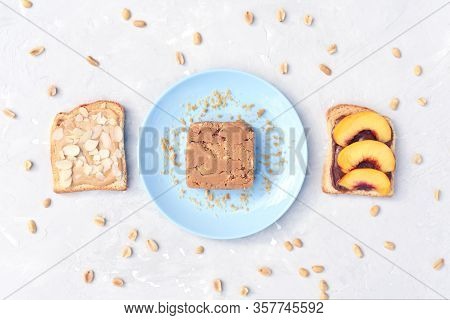 Delicious Toast Peanut Butter, Nectarine And Almonds. Tasty And Healthy Breakfast.