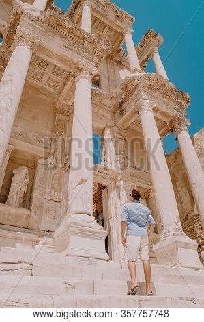 Ephesus, Turkey People Are Observing Ruins Of Celsus In Ephesus Ancient City In Turkey. Men Visit Ep