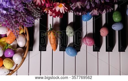 Paschal Easter Eggs And Piano Keys And Flowers