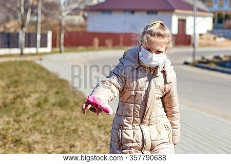 A Child With White Hair In A Jacket And Medical Mask. Prohibition Of School Attendance. Insulation.