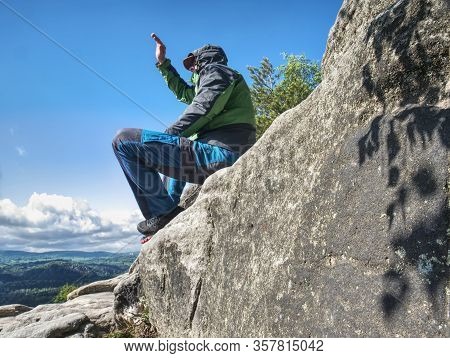Man Meditating In Mountains. Travel Lifestyle Relaxation Emotional Concept Adventure Summer Vacation