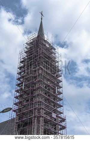 Sint Gillis Waas, Belgium, 16 August 2019, The Tower Of The Sant'egidio Church In Scaffolding For Re