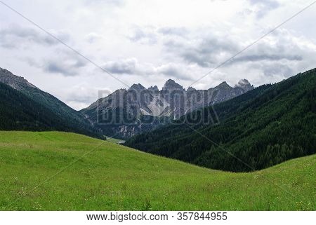Summer View To Meadow And Mountain Range In Axamer Lizum Area, Tyrol, Austria