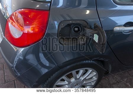 Bristol-march 2020-england-a Close Up View Of A Open Pertol Cap On The Side Of A Car At The Petrol S