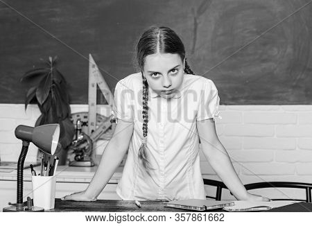 Hooked On Learning. Hometask Concept. Small Kid Study School. Girl Cute Child Sit School Classroom C