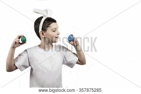 Easter Eggs. Happy Easter. Multi-colored Easter Eggs. Easter Eggs On A White Background. Rabbits Boy